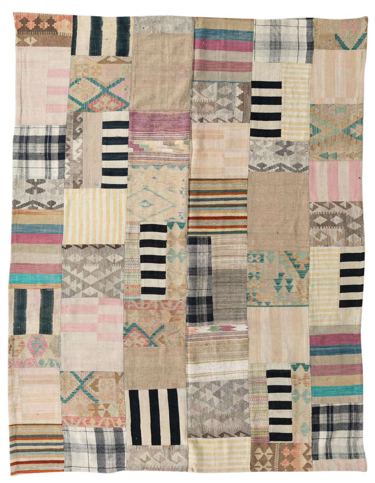 A 6x9 rectangular multi-colored wool Kilim Patchwork rug with Southwestern, tribal, and abstract patterns, suitable for a living room.
