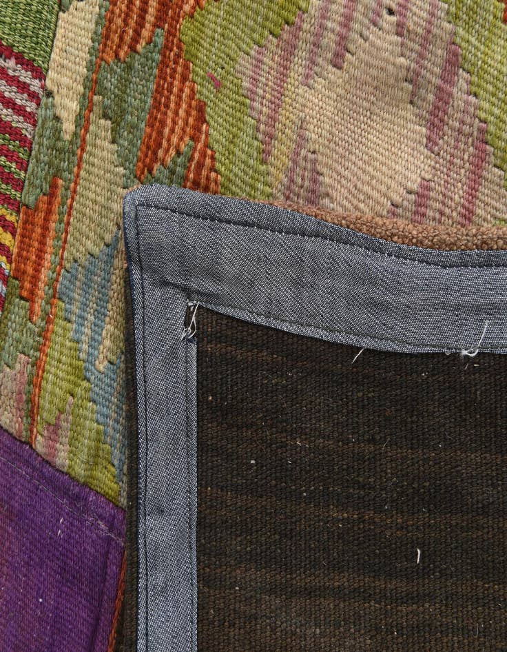 Detail image of  6' 6 x 9' 4  Hand Woven Kilim Patchwork Wool Rug