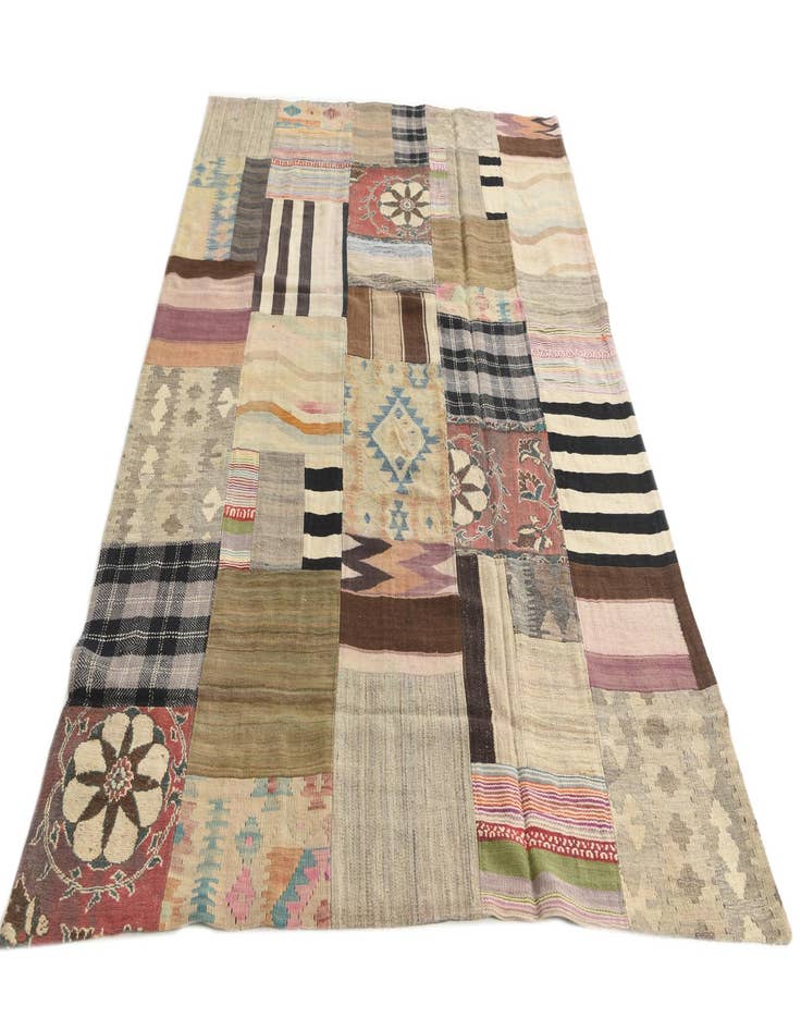 Detail image of  5' 4 x 8' 2  Hand Woven Kilim Patchwork Wool Rug