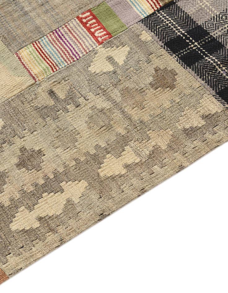 Detail image of  5' 4 x 8' 2  Hand Woven Kilim Patchwork Wool Rug