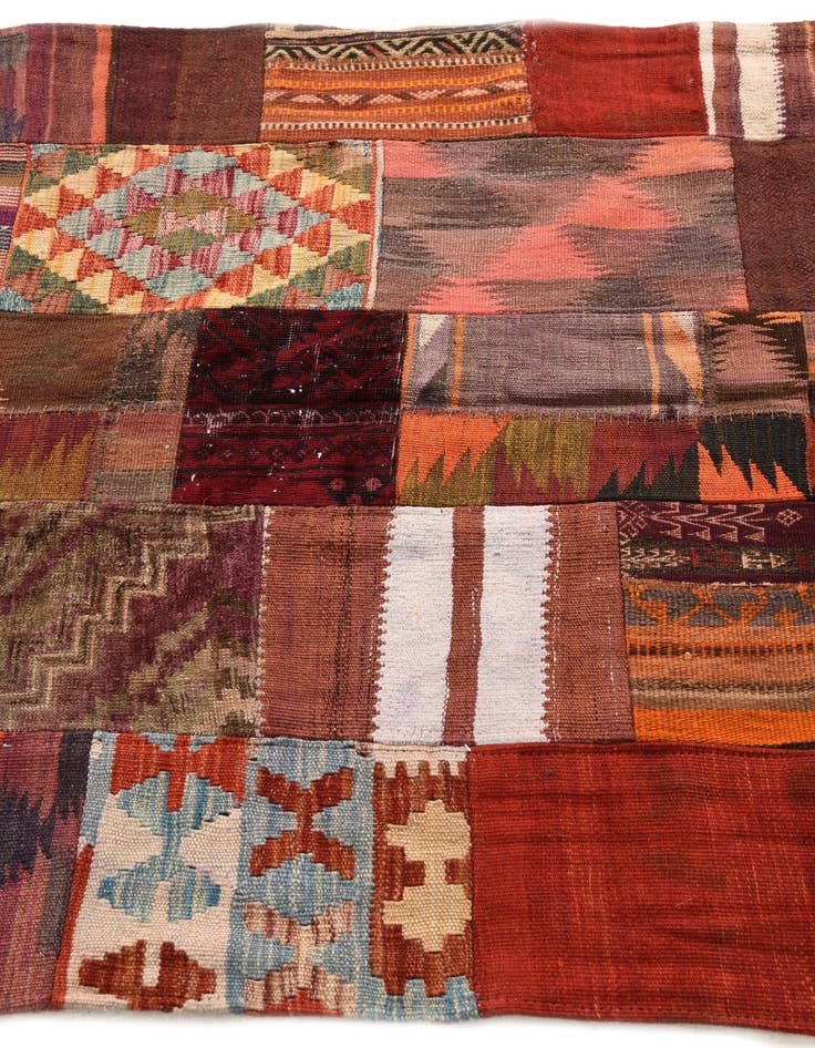 Detail image of  3' 11 x 6' 1  Hand Woven Kilim Patchwork Wool Rug