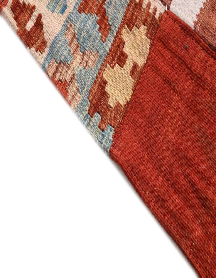 Detail image of  3' 11 x 6' 1  Hand Woven Kilim Patchwork Wool Rug
