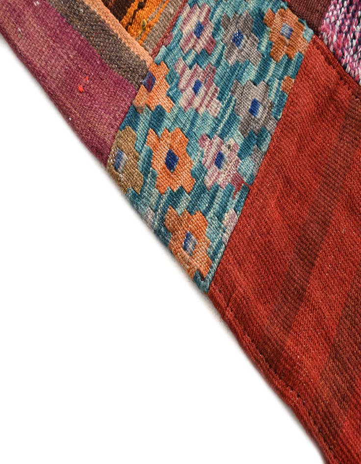 Detail image of  3' 11 x 5' 10  Hand Woven Kilim Patchwork Wool Rug