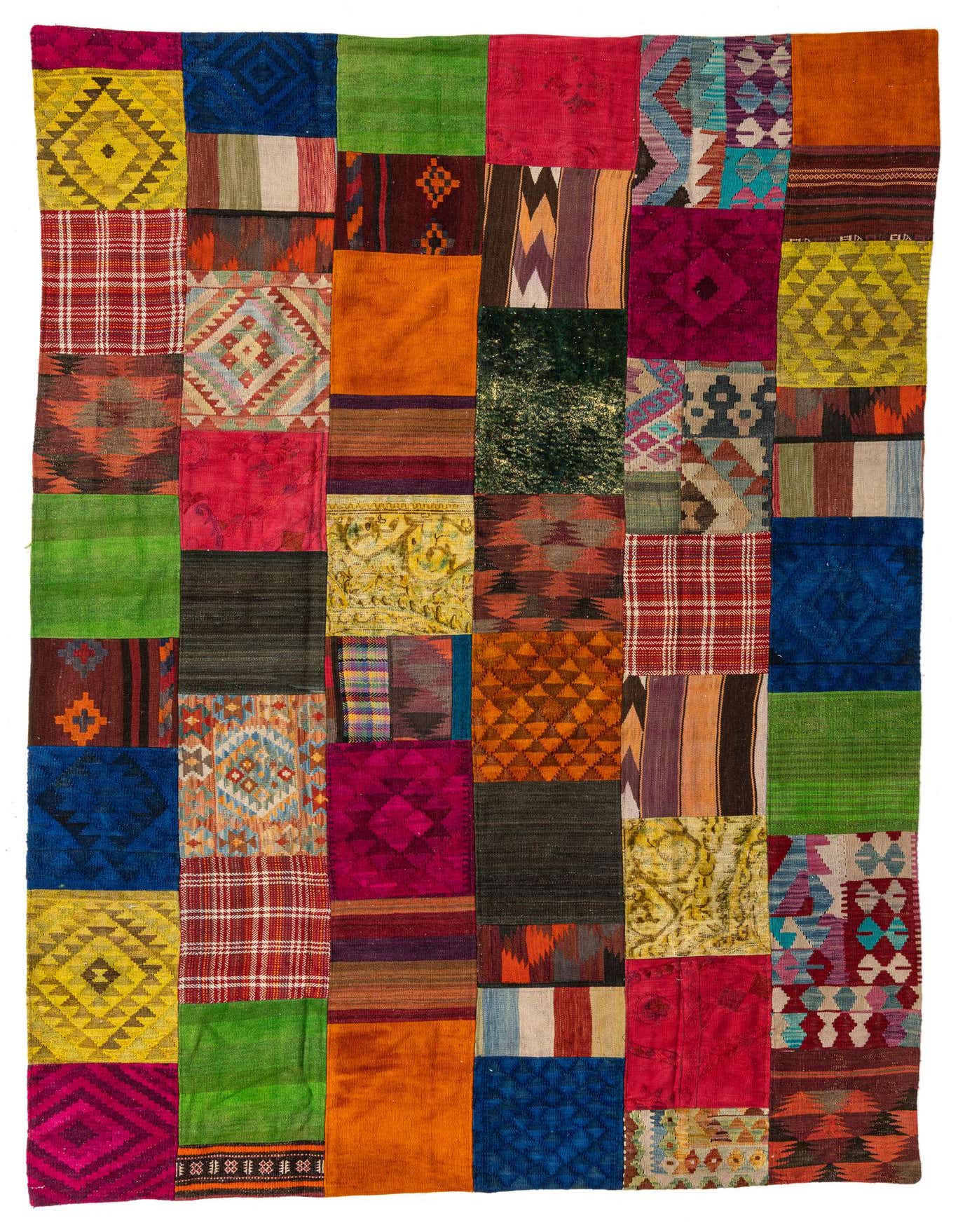 A vibrant 7x10 multi-colored rectangular Kilim Patchwork rug, handmade from wool, featuring diverse Southwestern and tribal patterns, ideal for a living room.