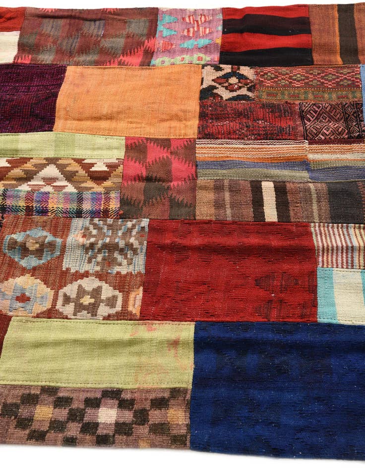 Detail image of  4' 2 x 5' 11  Hand Woven Kilim Patchwork Wool Rug
