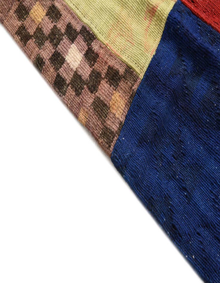 Detail image of  4' 2 x 5' 11  Hand Woven Kilim Patchwork Wool Rug