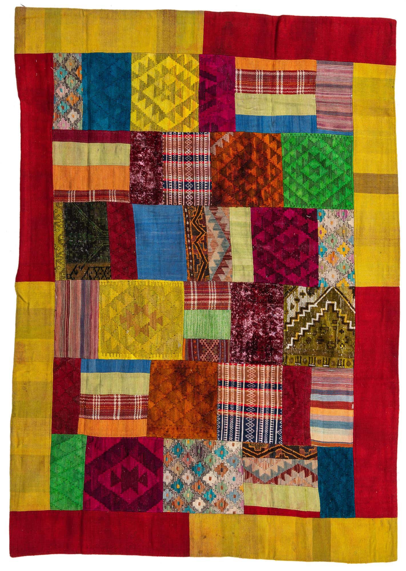 A vibrant 5x8 rectangular Kilim Patchwork rug with a multi-colored tribal and abstract design, featuring a red and yellow border.
