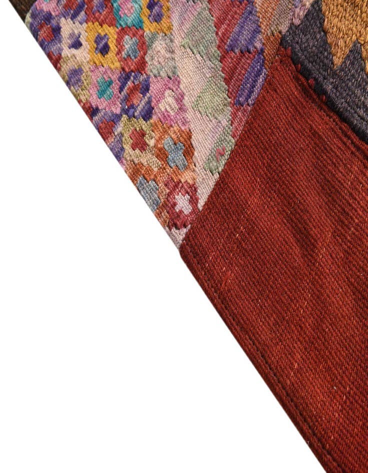 Detail image of  4' 10 x 6' 6  Hand Woven Kilim Patchwork Wool Rug