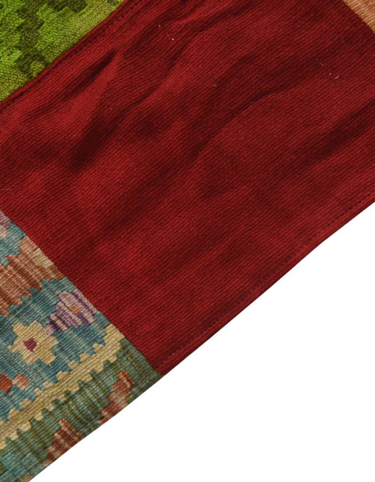 Detail image of  5' 3 x 7' 7  Hand Woven Kilim Patchwork Wool Rug