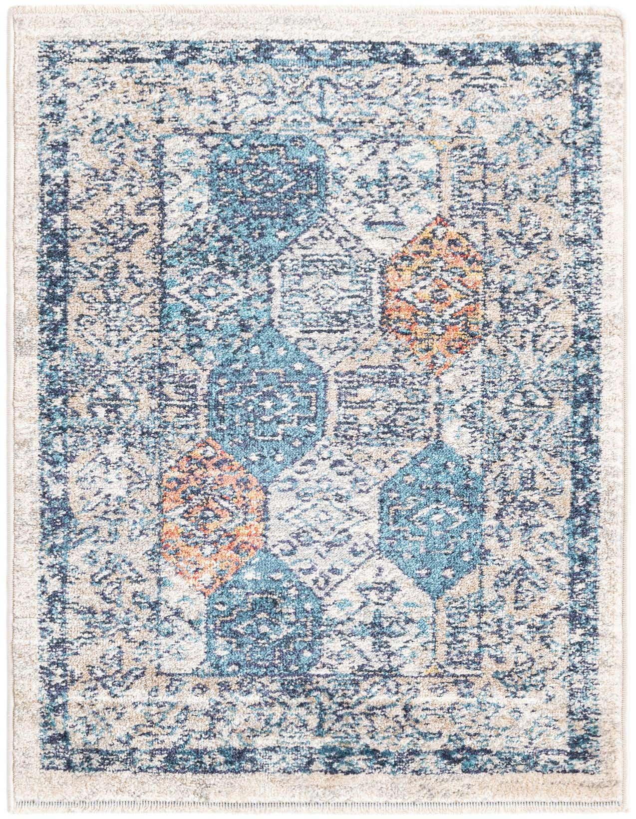 A 2x3 rectangular Lola collection rug featuring a distressed traditional pattern in multi-colored hues of blue, orange, and beige.