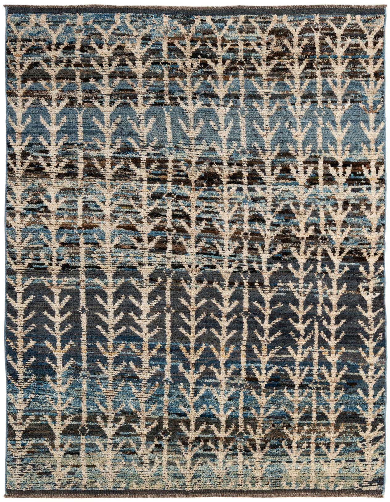 A 5x8 rectangular multi-colored tribal shag rug with a modern tree-like pattern, ideal for a living room.