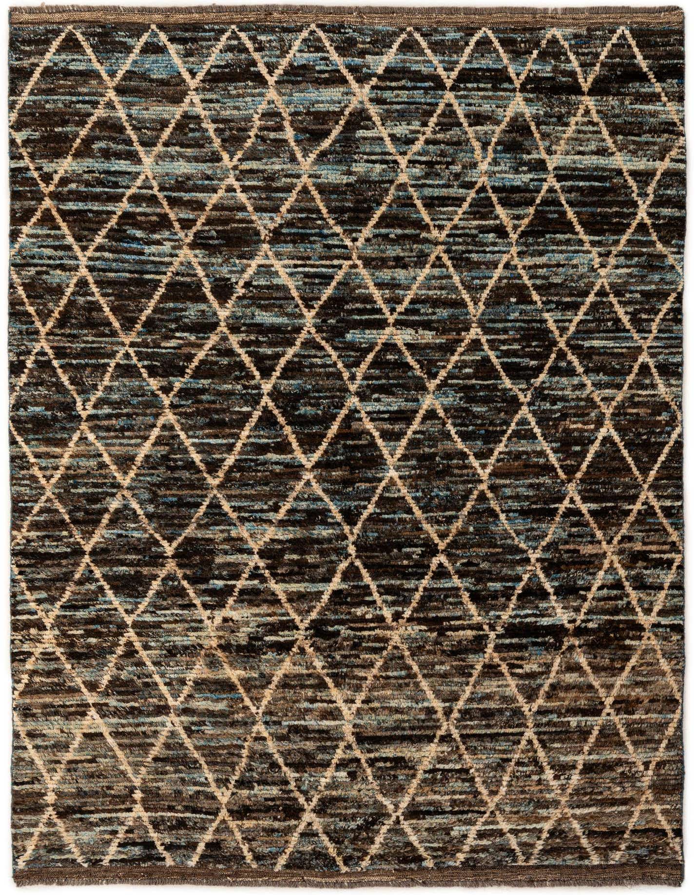 A 5x8 rectangular multi-colored wool rug featuring a tribal diamond pattern over a textured black and blue background.