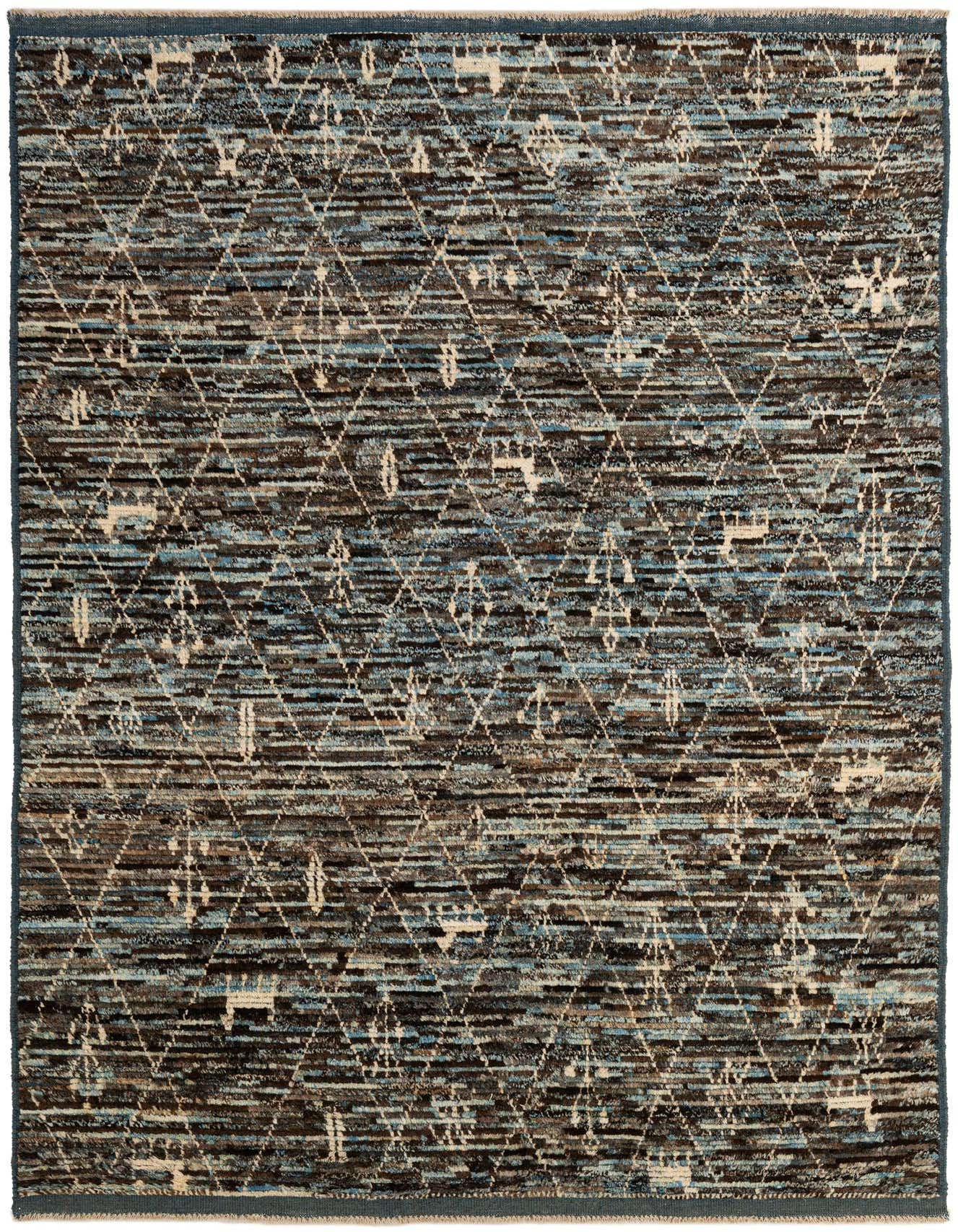 A 6x9 rectangular multi-colored tribal wool rug with a modern geometric diamond pattern and abstract horizontal stripes.