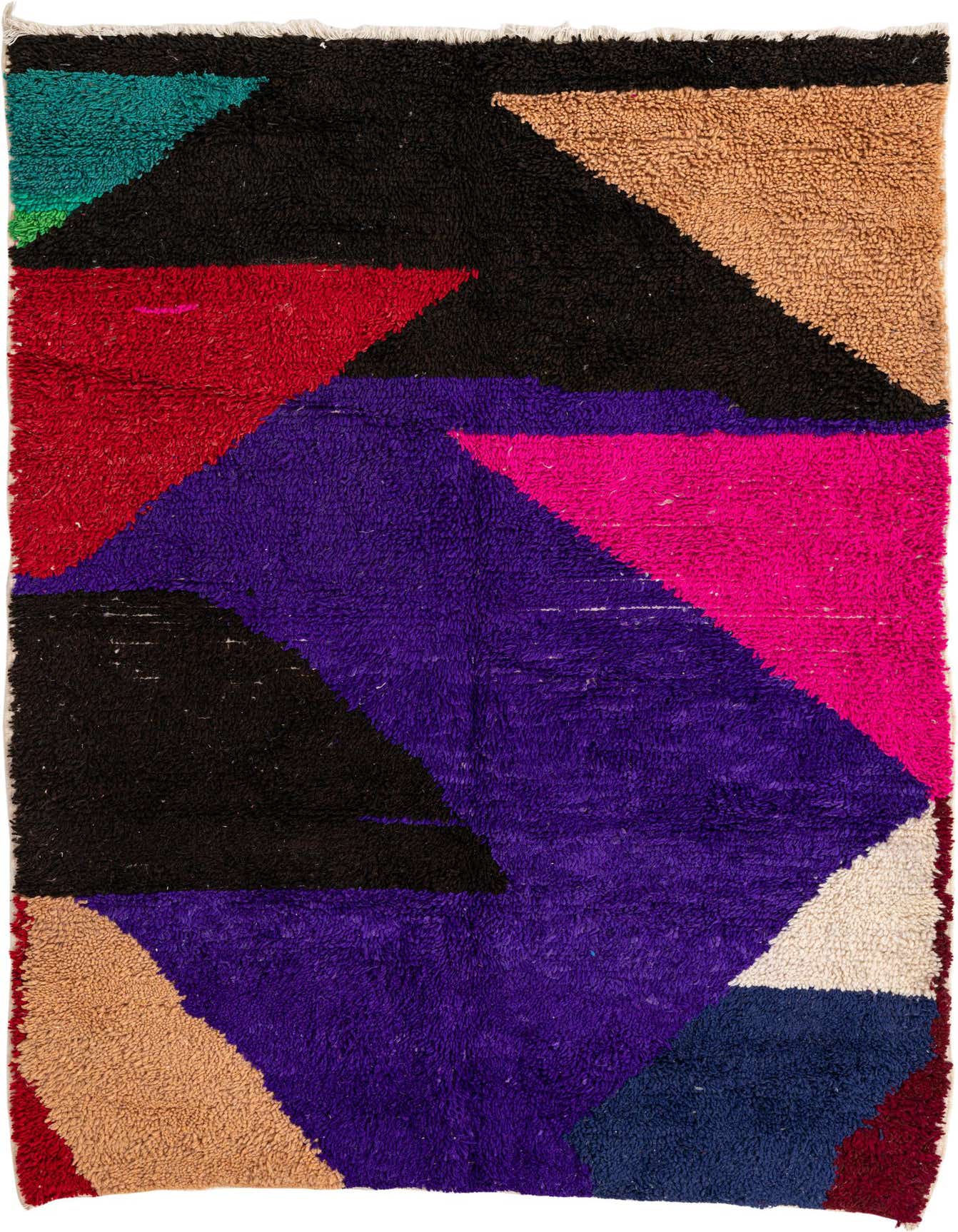 A vibrant 5x8 rectangular shag rug featuring a bold abstract pattern with blocks of purple, black, red, pink, teal, and beige.