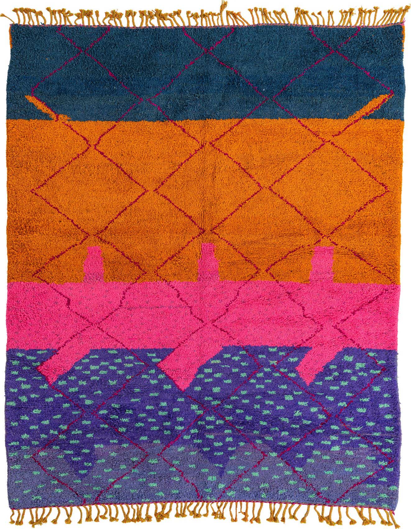 A vibrant 6x9 rectangular multi-colored shag rug with tribal patterns in blue, orange, pink, and purple, featuring diamond and abstract shapes.