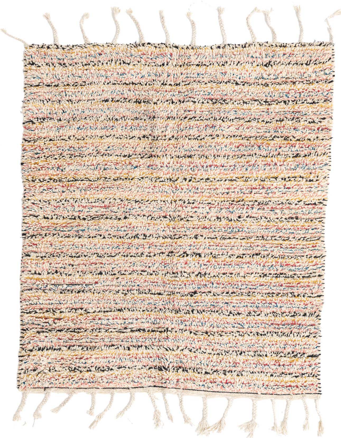 A 4x6 rectangular shag rug with a multi-colored tribal pattern, featuring cream, pink, yellow, blue, and black threads, with braided tassels on the ends.