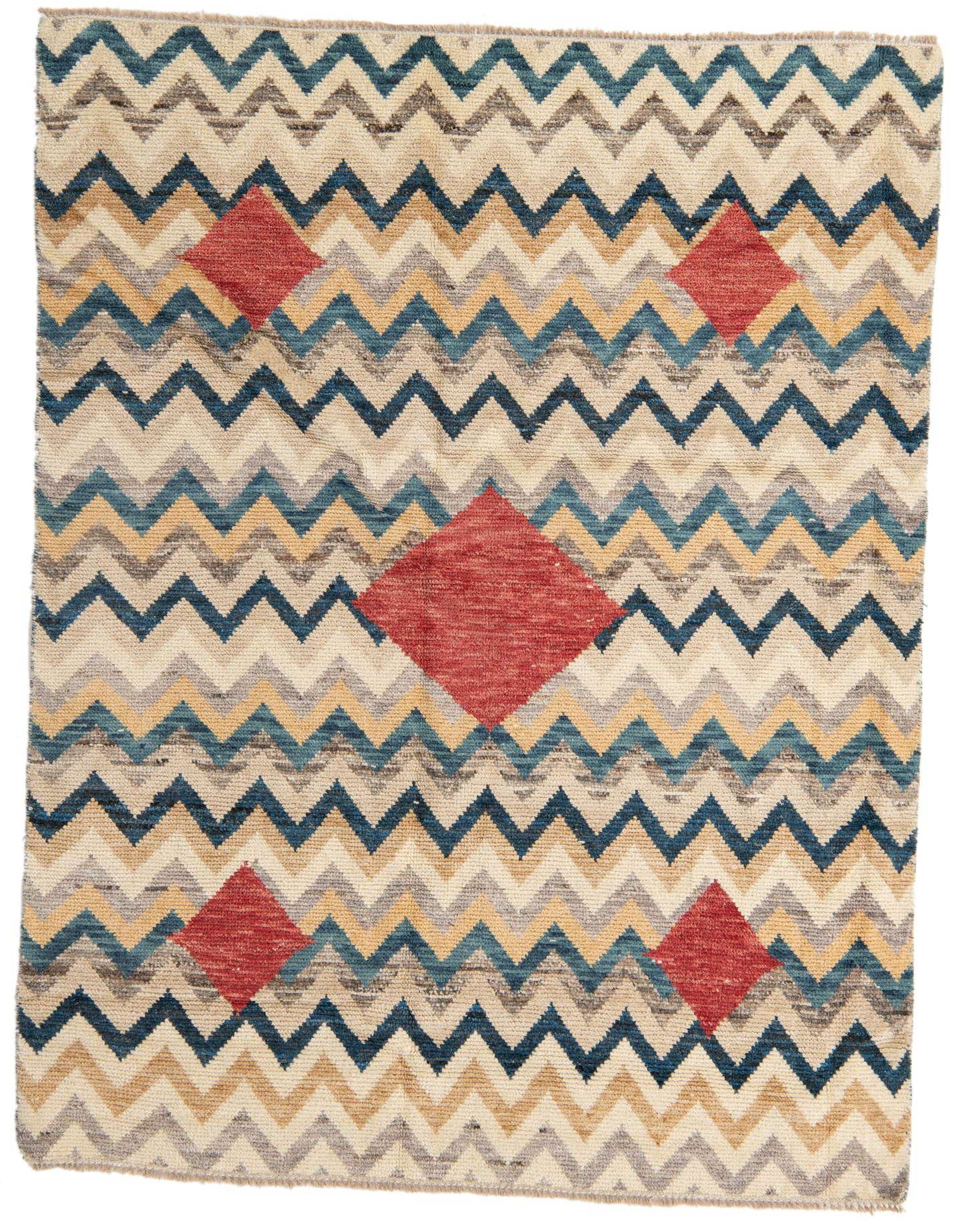 A 6x9 rectangular multi-colored tribal shag rug with a zigzag pattern and red diamond accents, ideal for a living room.