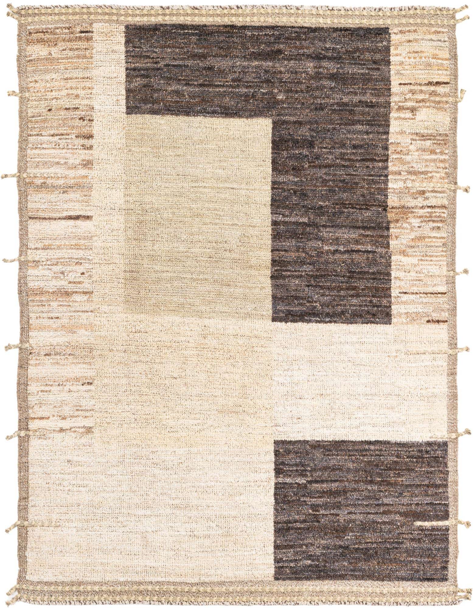 A 5x8 rectangular Moroccan shag rug with a modern tribal pattern in multi-colored wool, ideal for a living room.