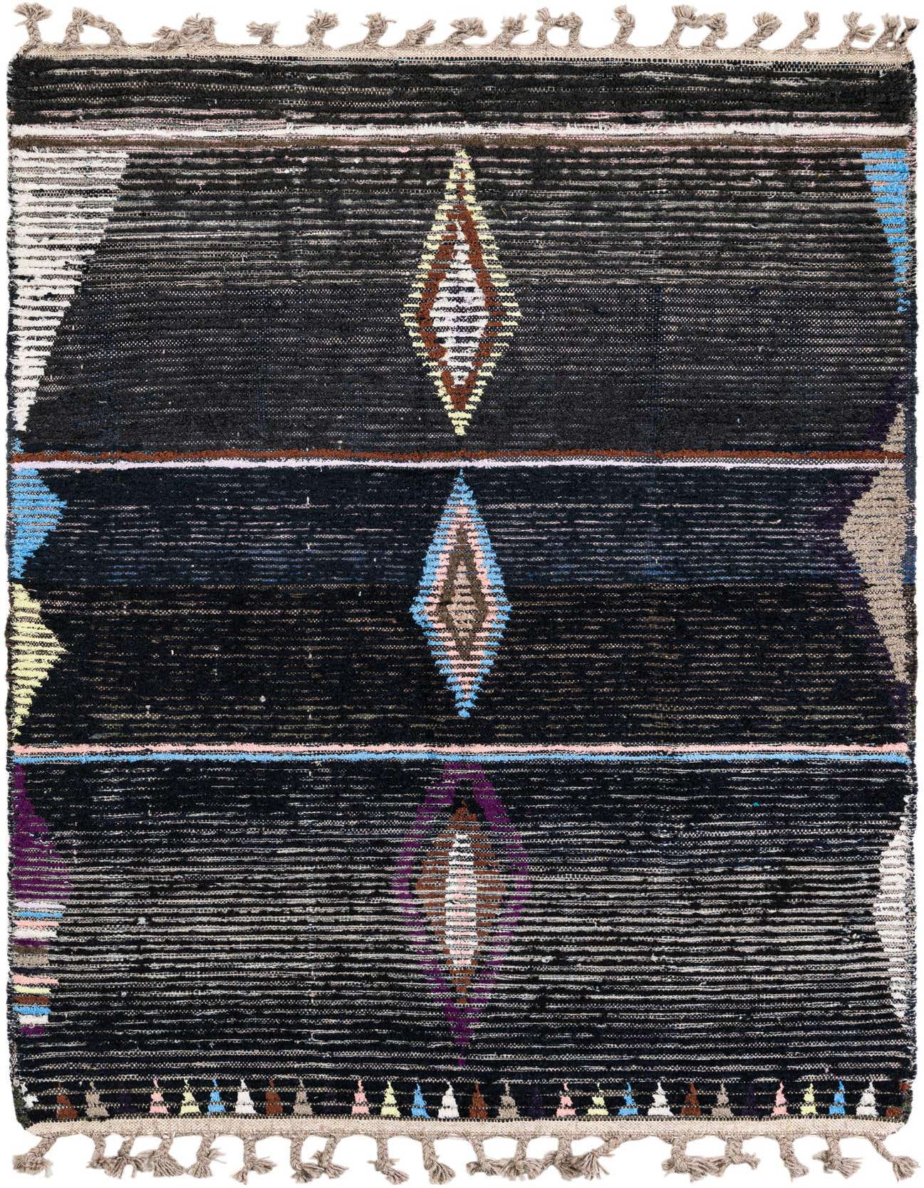 A 4x6 multi-colored rectangular shag rug with tribal diamond patterns and tassels, ideal for a living room.