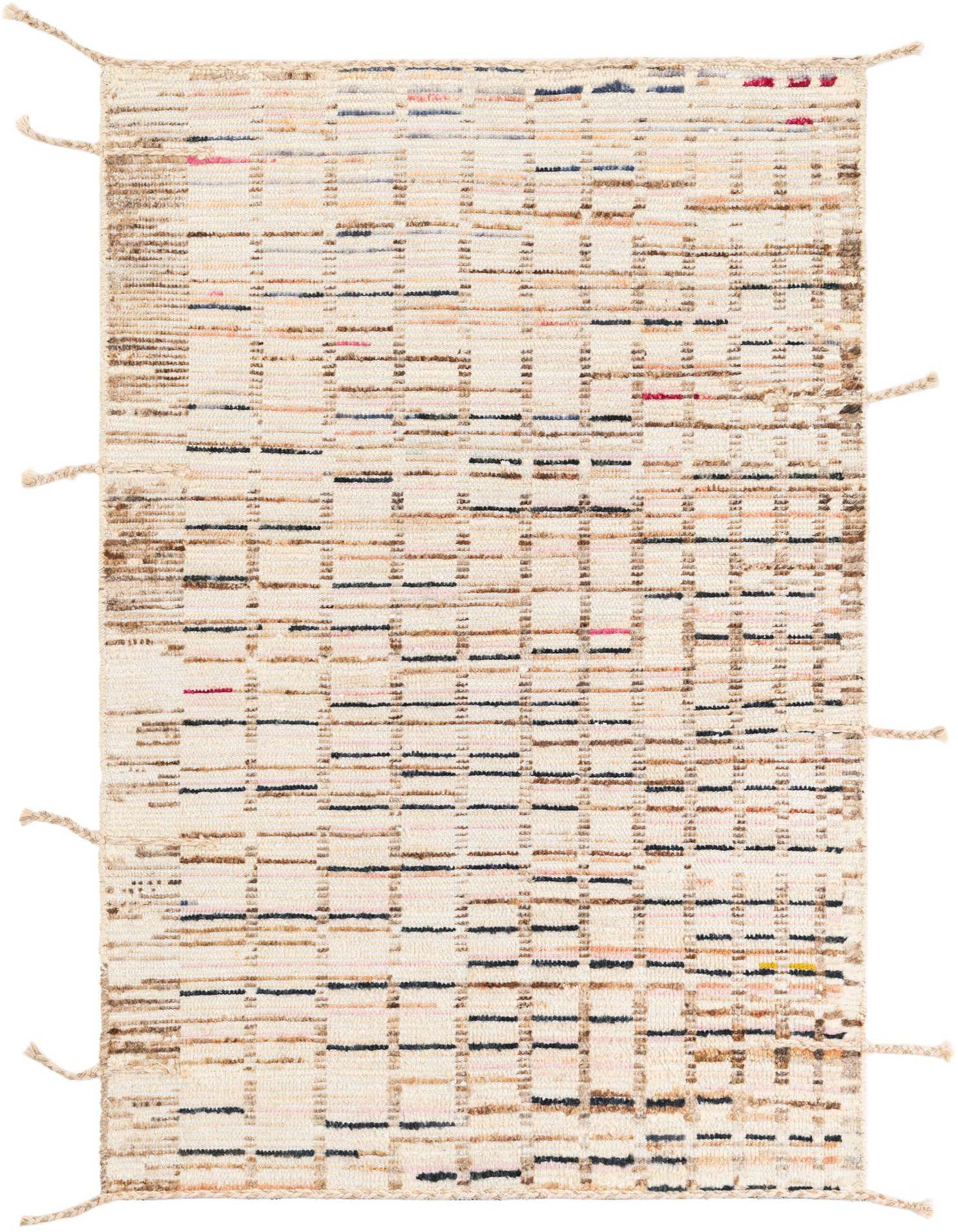 A 4x6 rectangular multi-colored shag wool rug with a modern tribal abstract pattern and braided tassels.