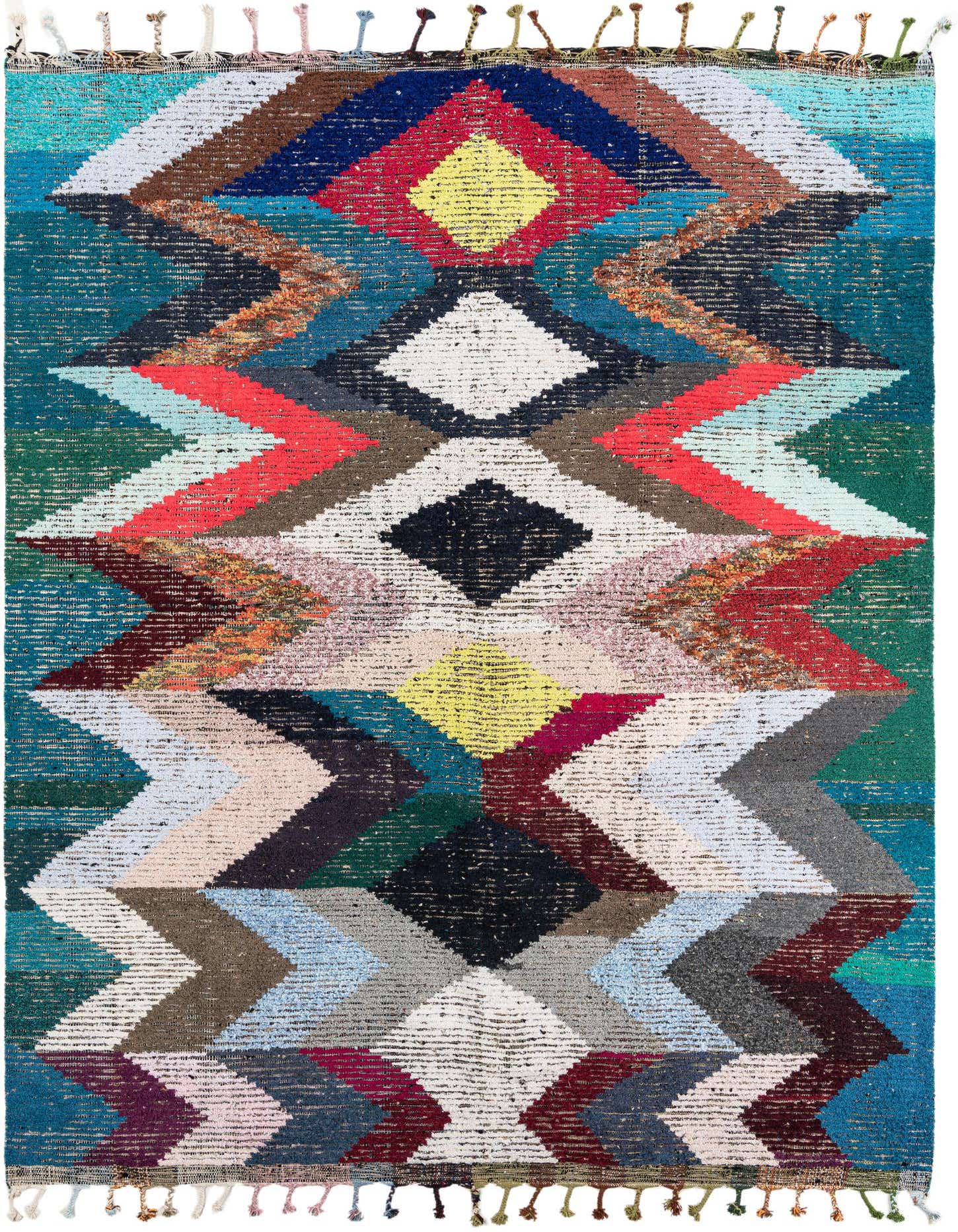 A vibrant 8x11 rectangular shag rug with a multi-colored tribal pattern, featuring diamonds and zigzags in various hues.