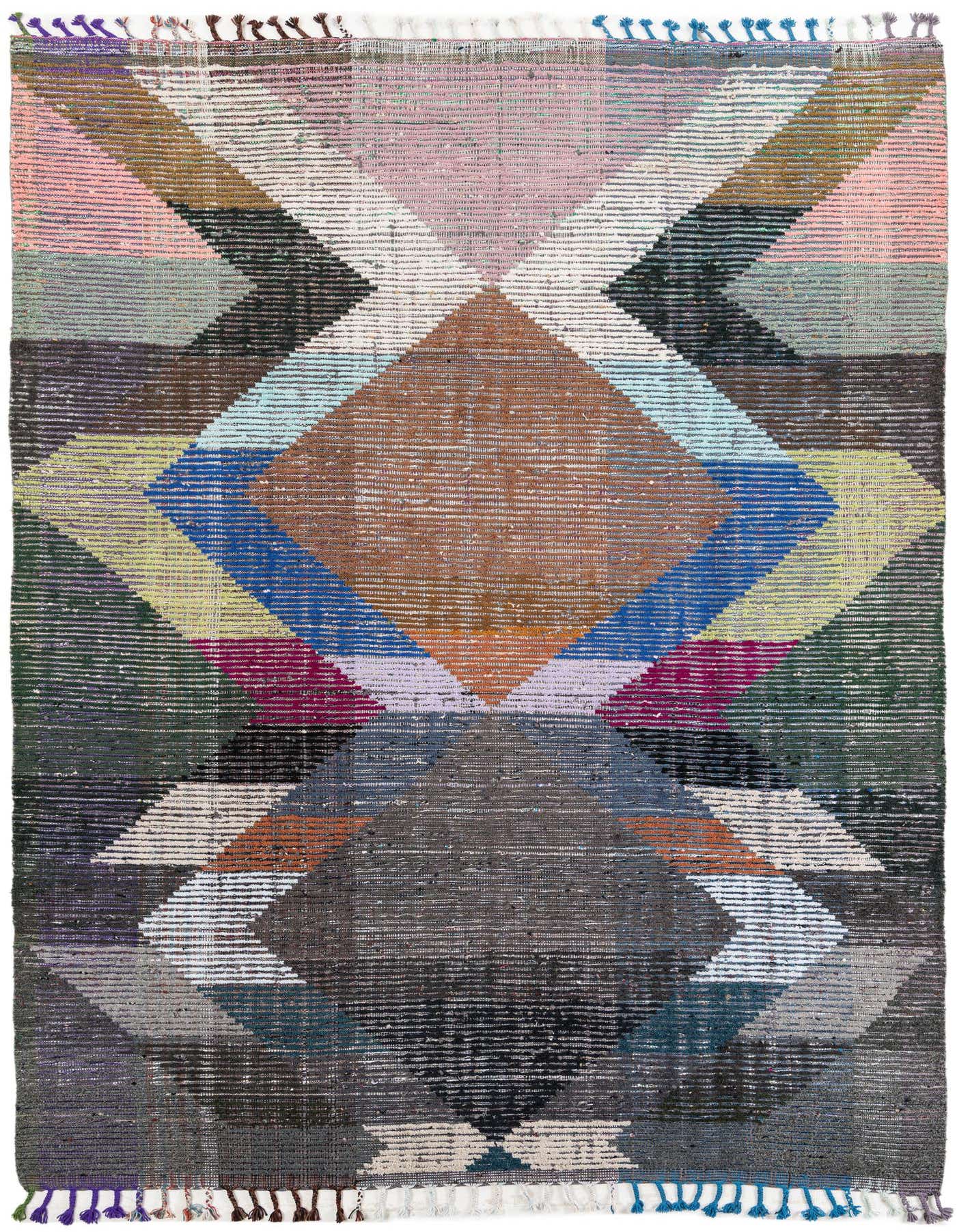 A rectangular 8x11 multi-colored wool shag rug with a modern tribal geometric pattern featuring large diamonds and chevron shapes.