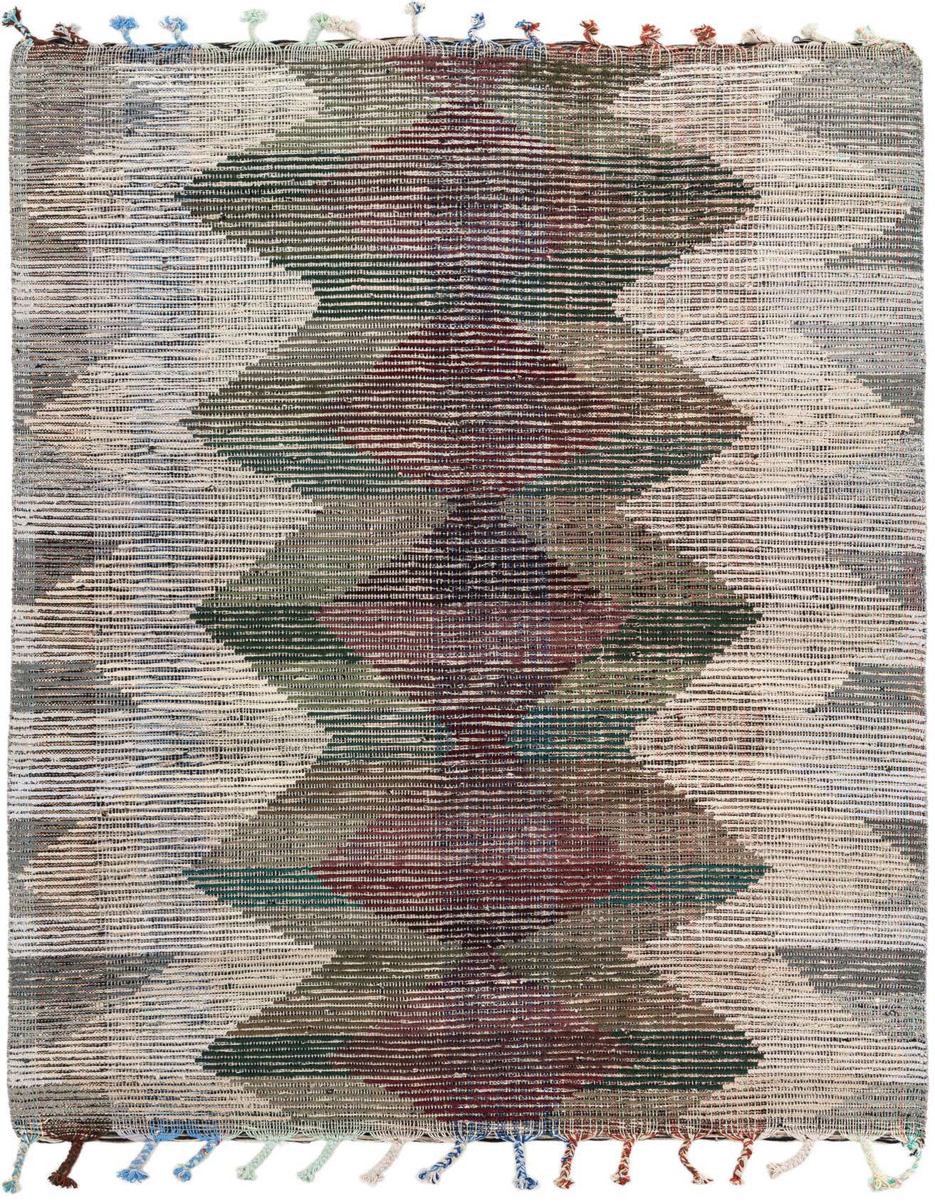 A 5x8 rectangular multi-colored tribal shag rug with large geometric diamond patterns and colorful tassels.