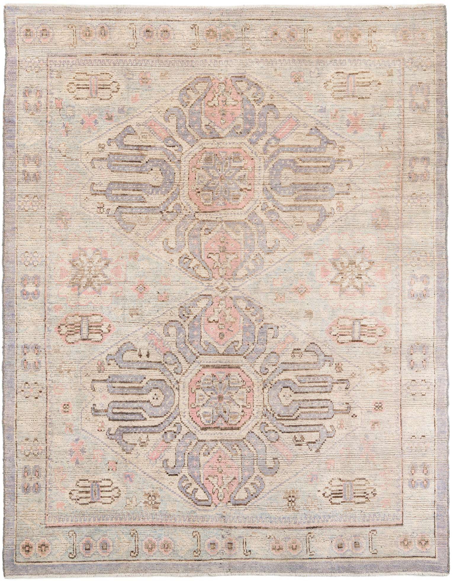 A 9x12 rectangular multi-colored wool shag rug with a tribal medallion pattern, ideal for a living room.