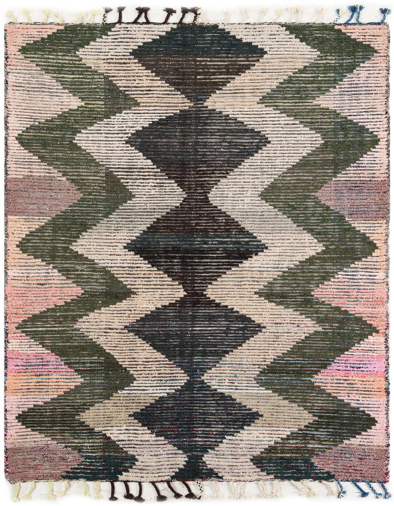 A 5x8 rectangular multi-colored shag rug with a tribal diamond pattern in shades of green, black, and pink.