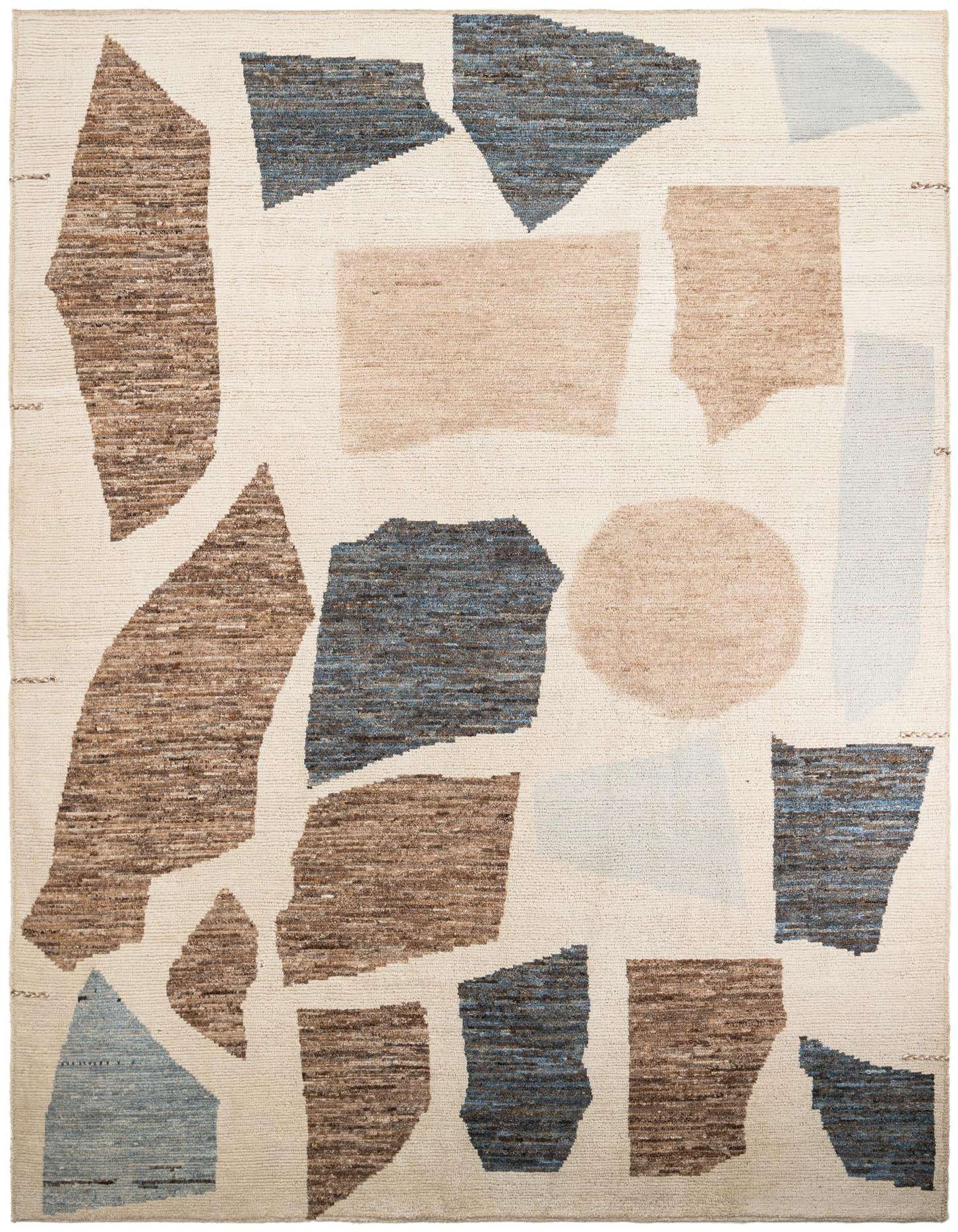 A 10x14 rectangular shag rug featuring an abstract tribal pattern with large shapes in shades of blue, brown, and light blue on a cream background.