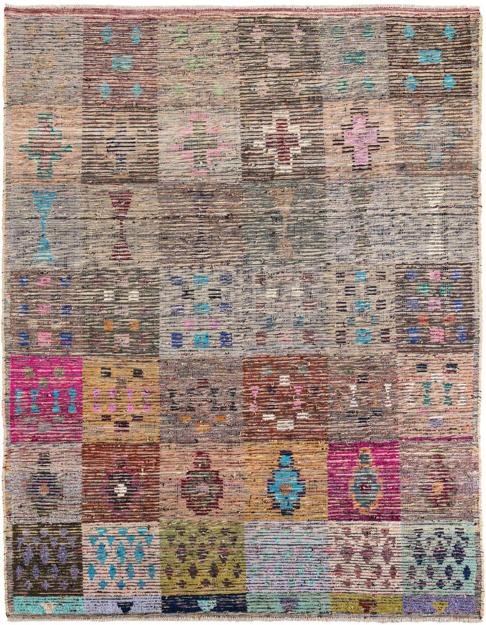 A colorful 8x10 rectangular shag rug featuring a multi-colored tribal abstract pattern with various geometric shapes.