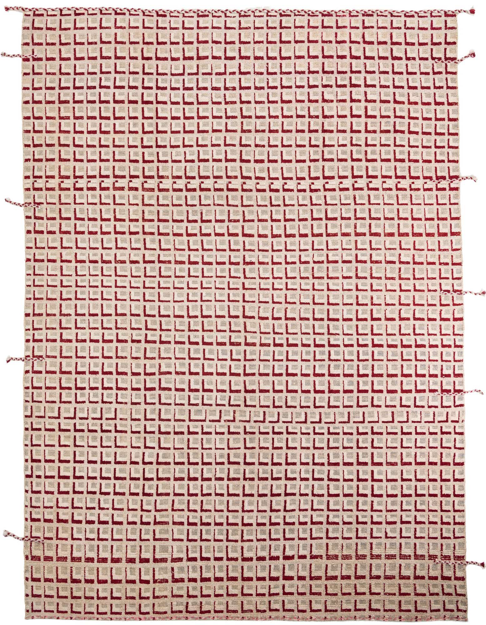 A 10x12 rectangular wool shag rug featuring a repeating pattern of small red and beige squares, with fringed edges.