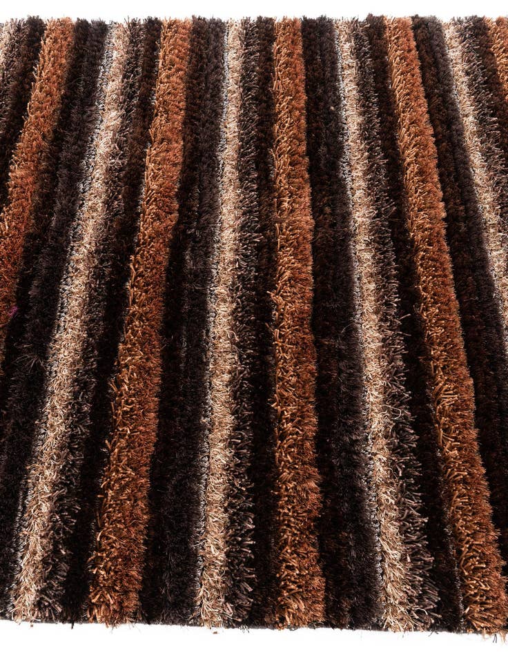 Detail image of  5' x 6' 8  Hand Knotted Multi-Tone Shag Rug