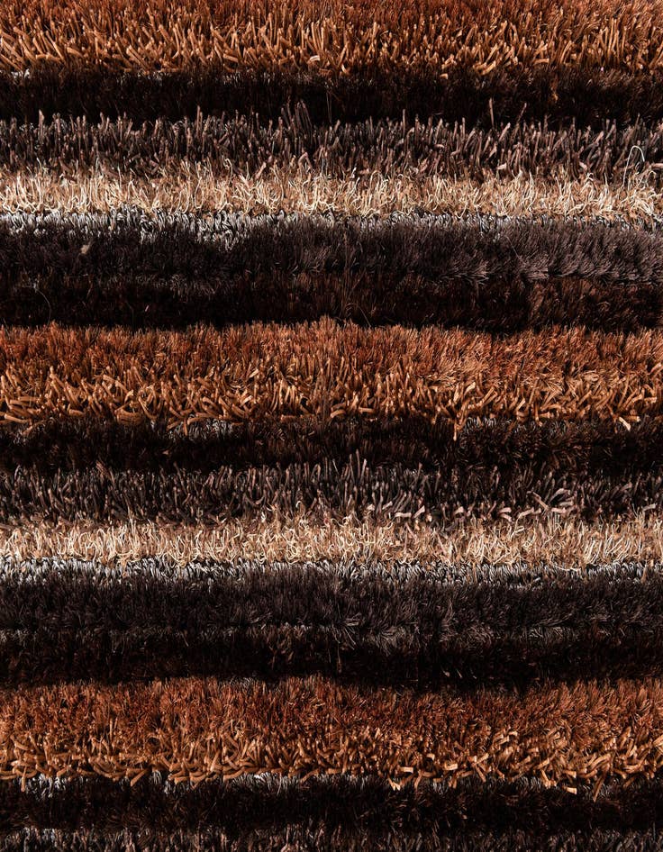 Detail image of  5' x 6' 8  Hand Knotted Multi-Tone Shag Rug