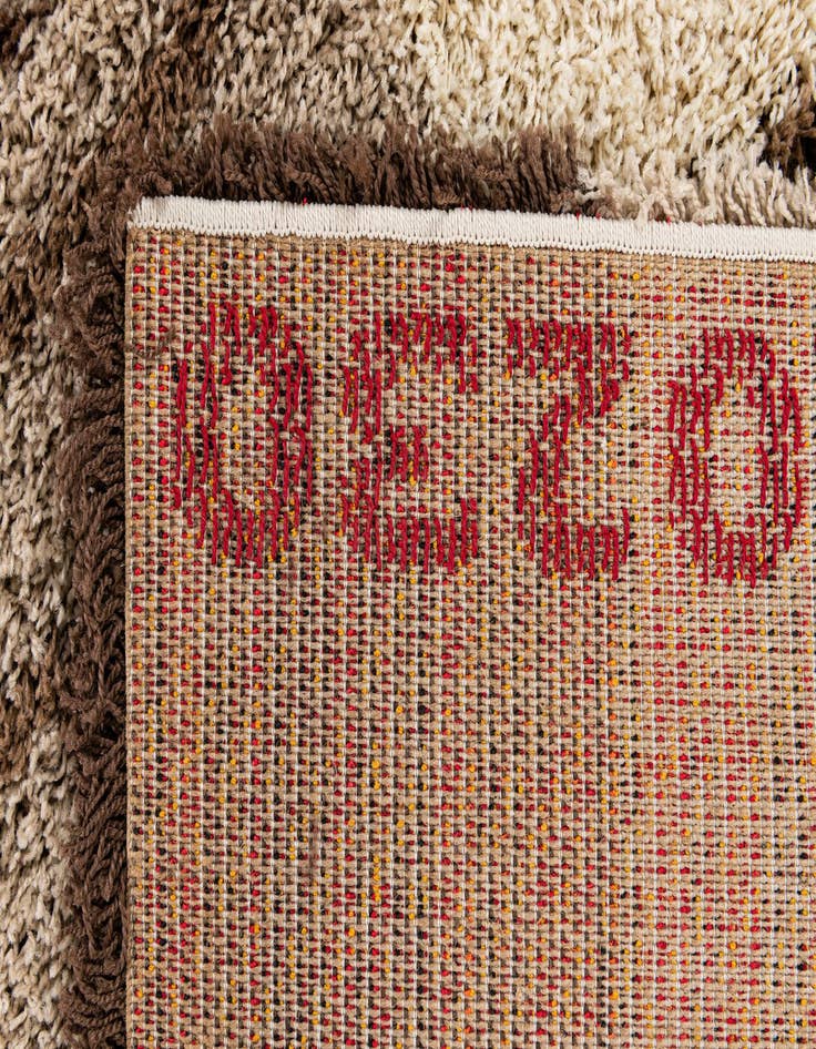 Detail image of  5' 3 x 7' 7 Multi-Tone Shag Rug