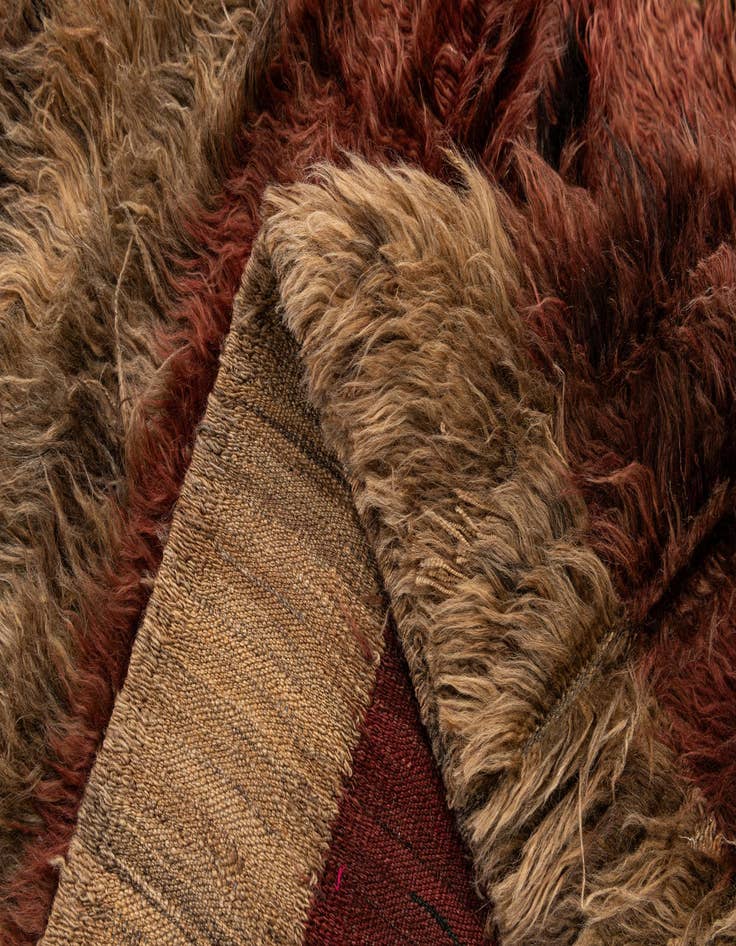 Detail image of  3' 11 x 6' 3  Hand Knotted Multi-Tone Shag Wool Rug