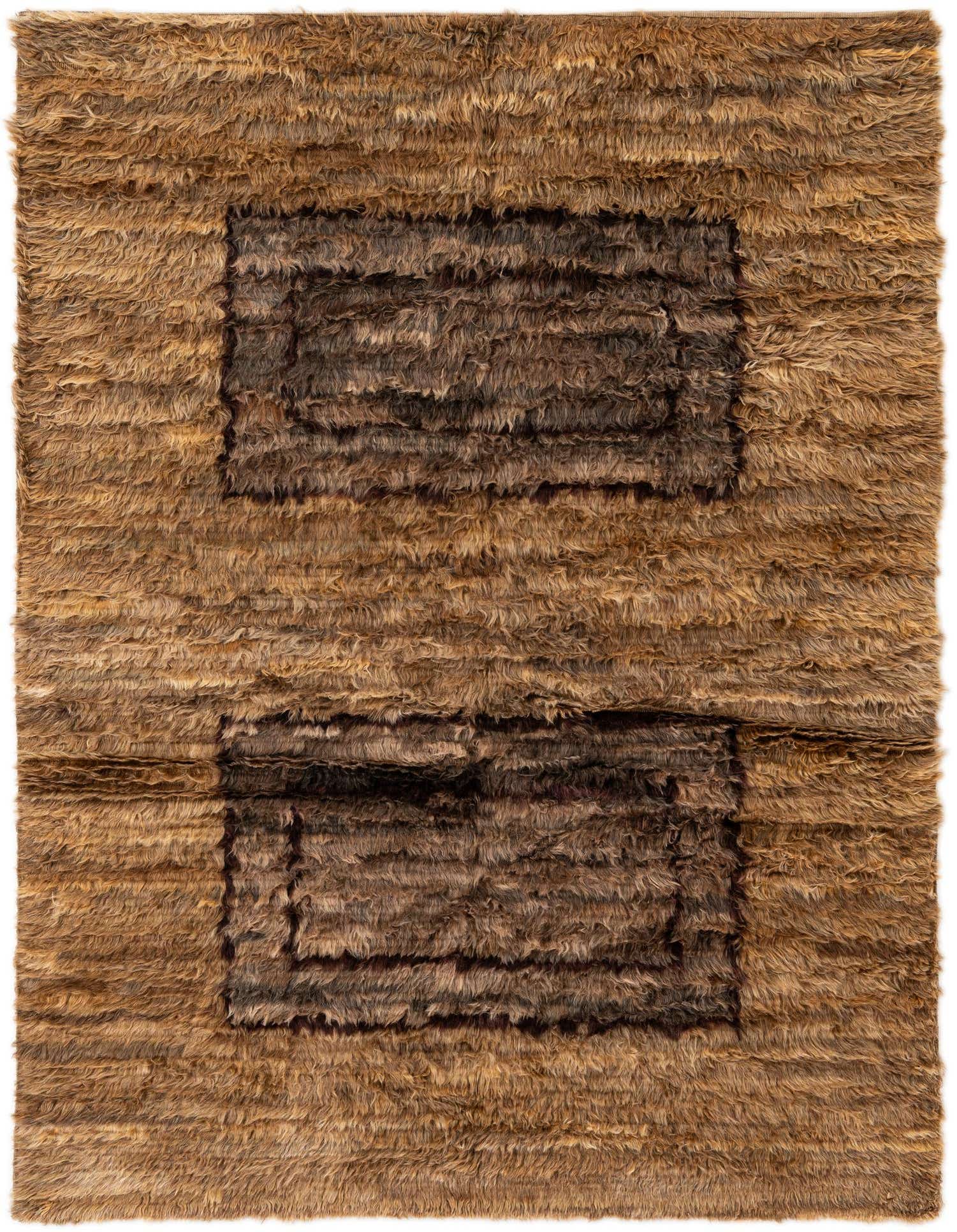 A 5x7 rectangular shag rug in multi-toned wool, featuring a modern abstract design with lighter brown and darker brown rectangular blocks.
