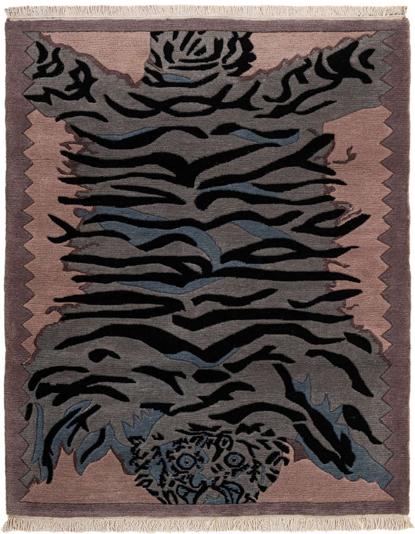 A 4x6 rectangular wool rug featuring a stylized tiger skin pattern in shades of grey, black, and blue, with a soft pink border.