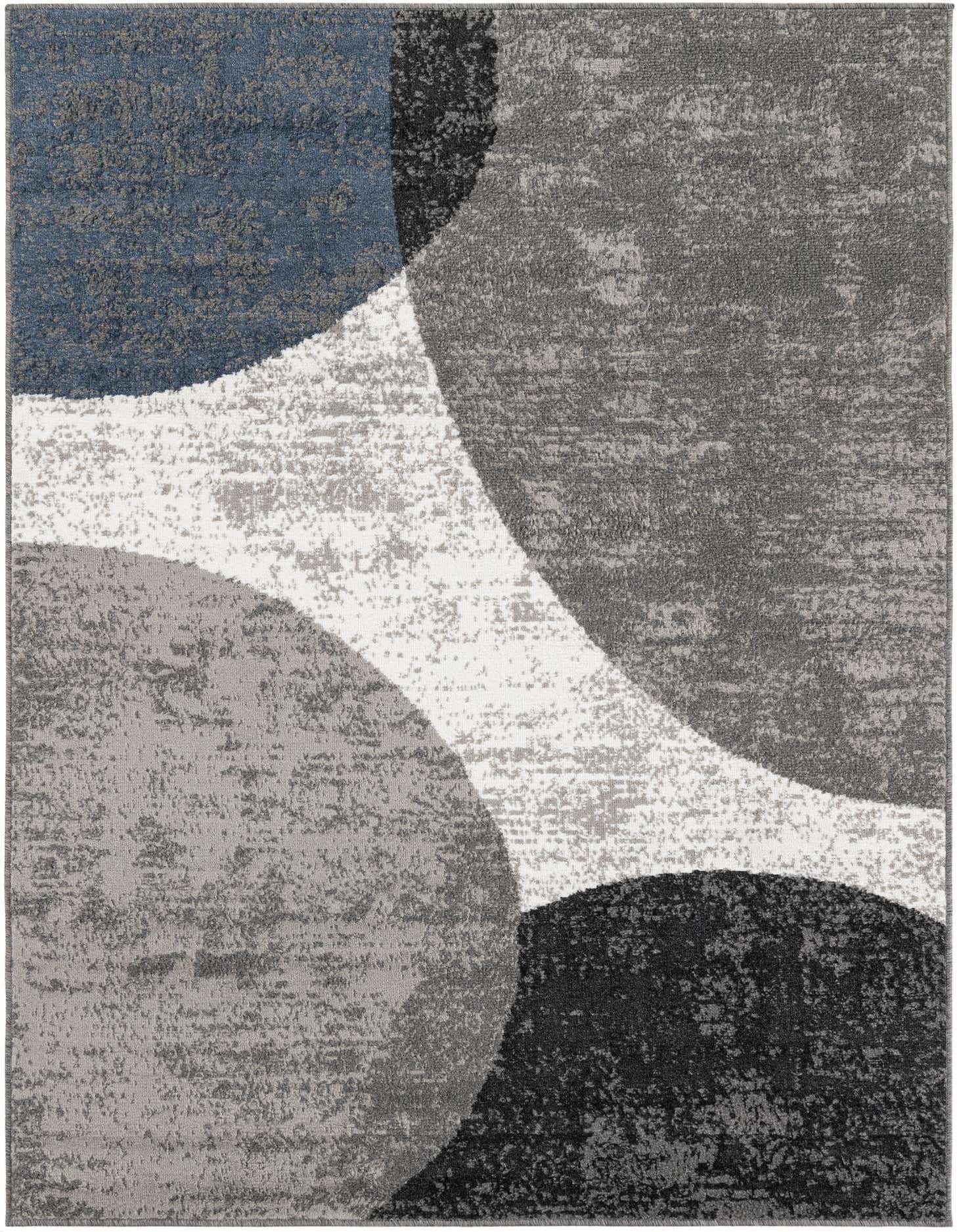 A 5x7 rectangular modern abstract rug with large overlapping shapes in shades of blue, gray, black, and white.