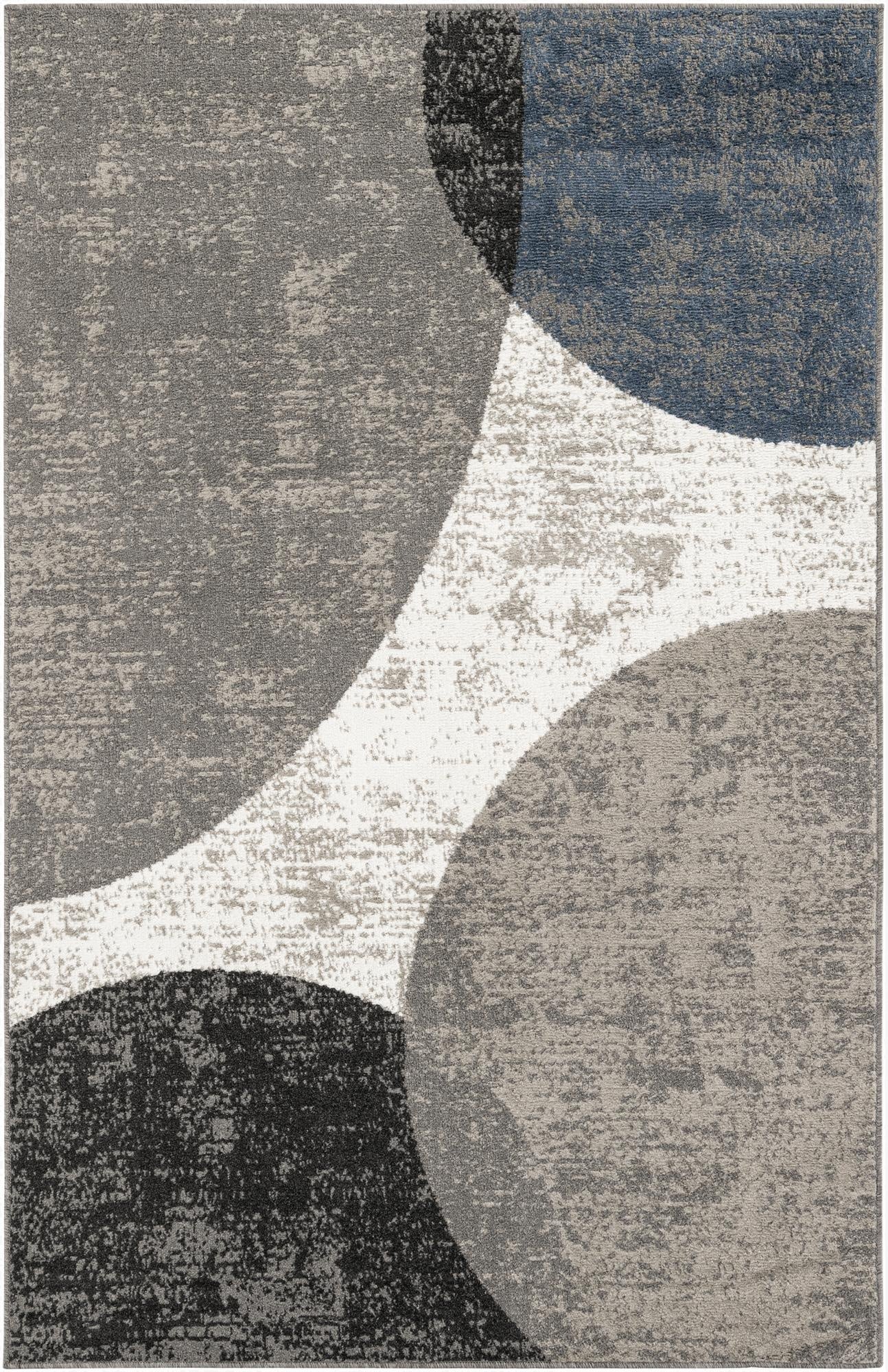 A 5x8 rectangular modern abstract rug featuring large overlapping shapes in shades of grey, black, white, and blue.