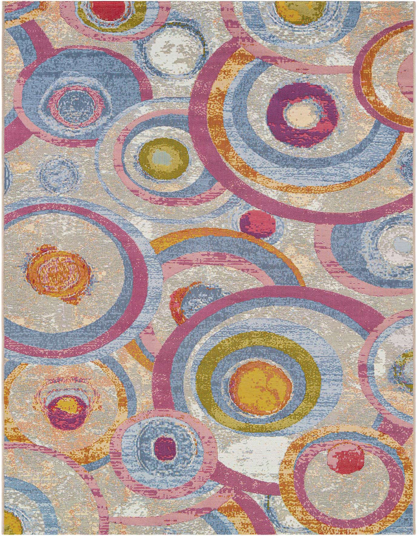 A 6x9 multi-colored rectangular rug featuring a modern abstract pattern of overlapping circles in various sizes and vibrant hues like blue, pink, orange, and green on a light background.