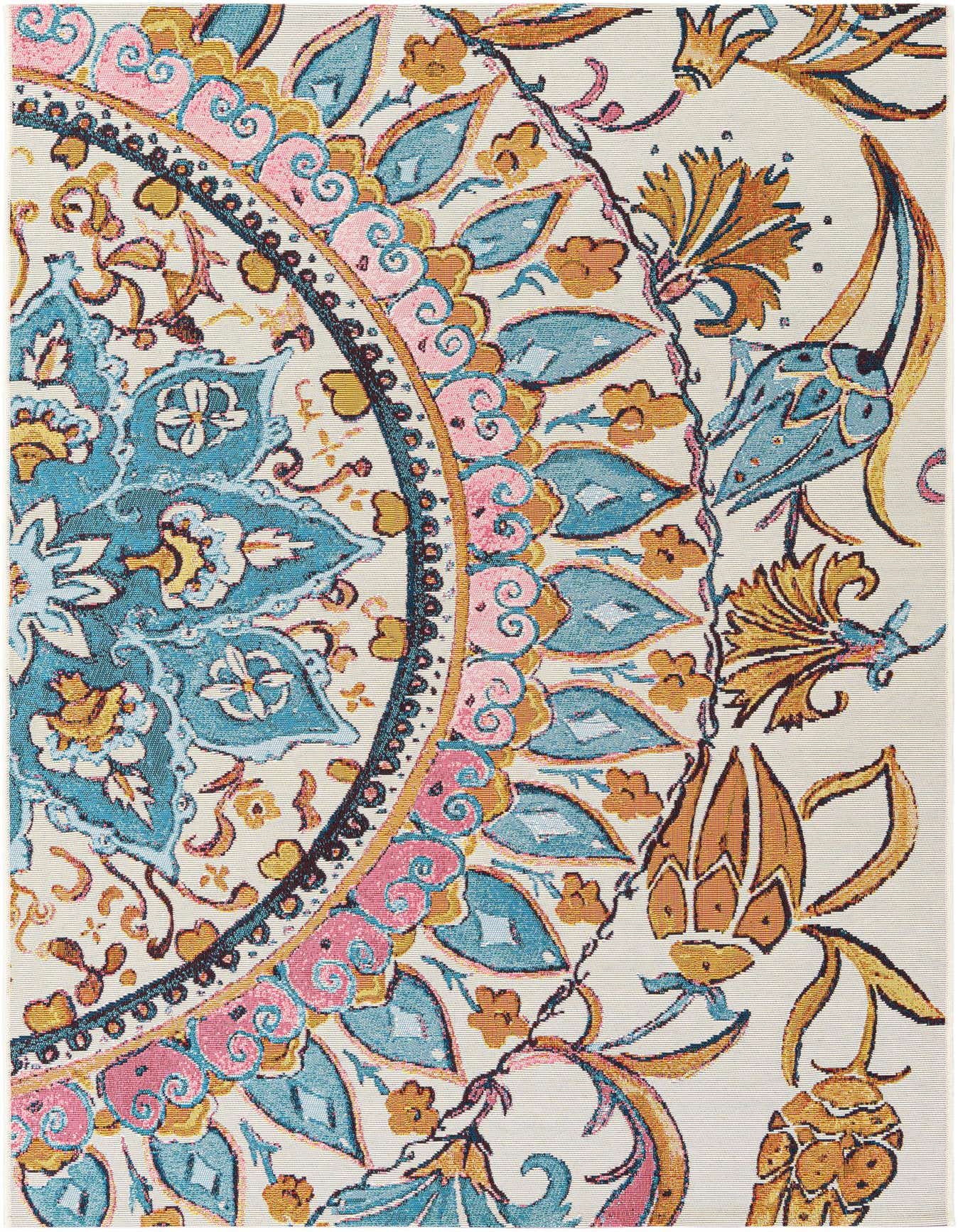 A close-up of a multi-colored modern flatweave rug featuring a vibrant medallion pattern in teal, pink, and gold on a cream background.