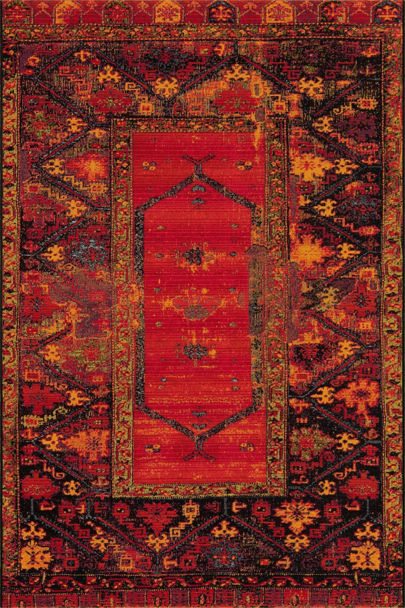 A vibrant 5x8 rectangular indoor/outdoor rug with a multi-colored tribal pattern, featuring a central red medallion and distressed black, orange, and yellow accents.