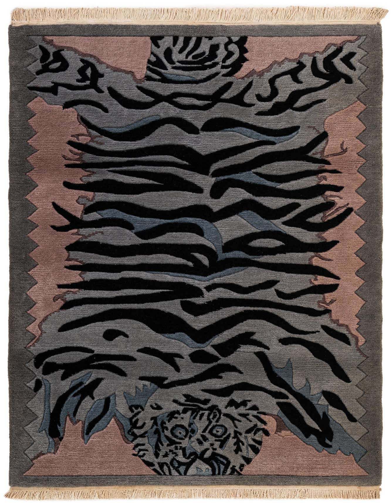 A 4x6 multi-colored rectangular wool rug with a modern tiger stripe pattern in shades of grey, black, and blue, with pink accents and fringe.