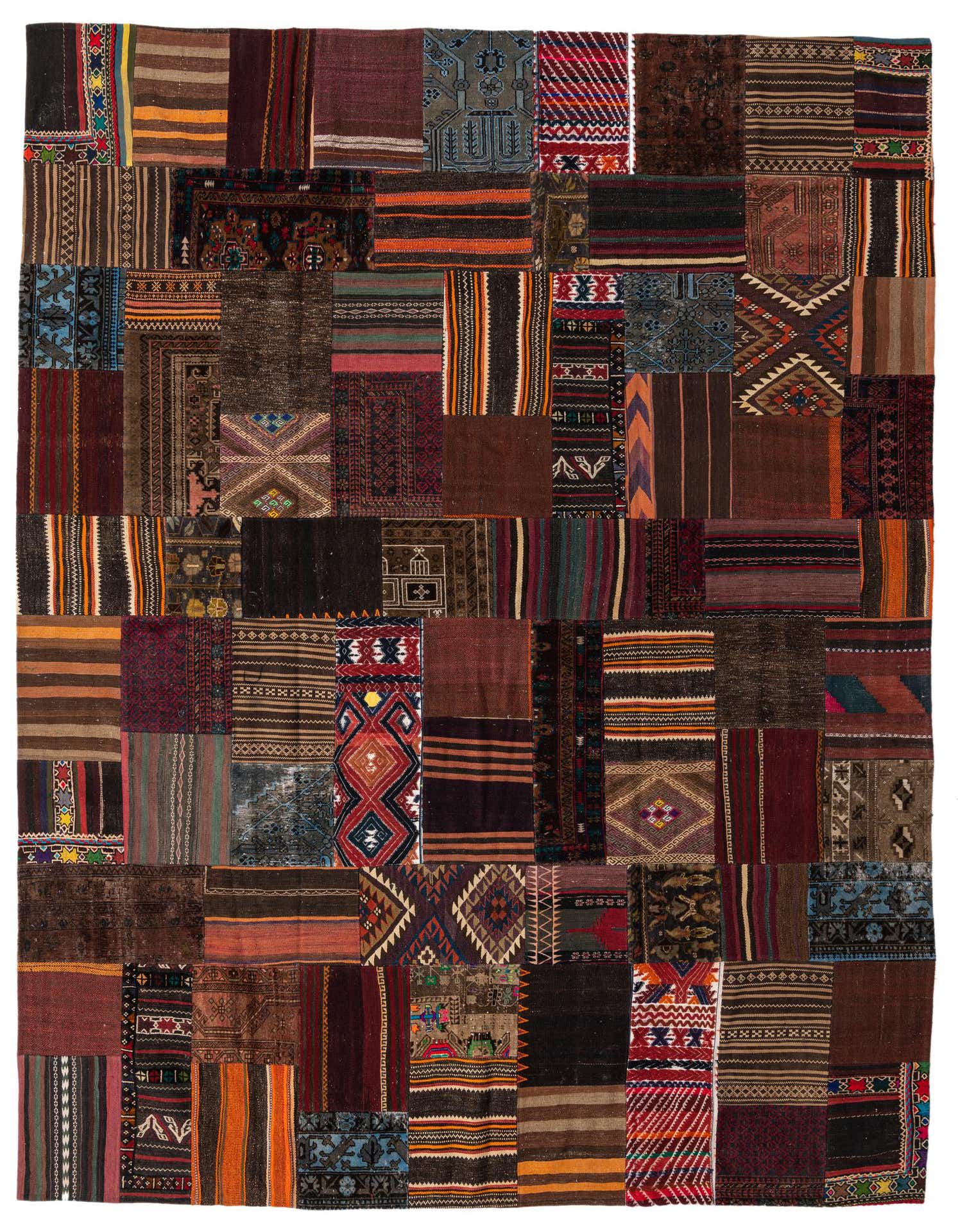 A 10x13 rectangular multi-colored patchwork wool rug, featuring various Persian and abstract patterns in warm, rich tones, ideal for a living room.