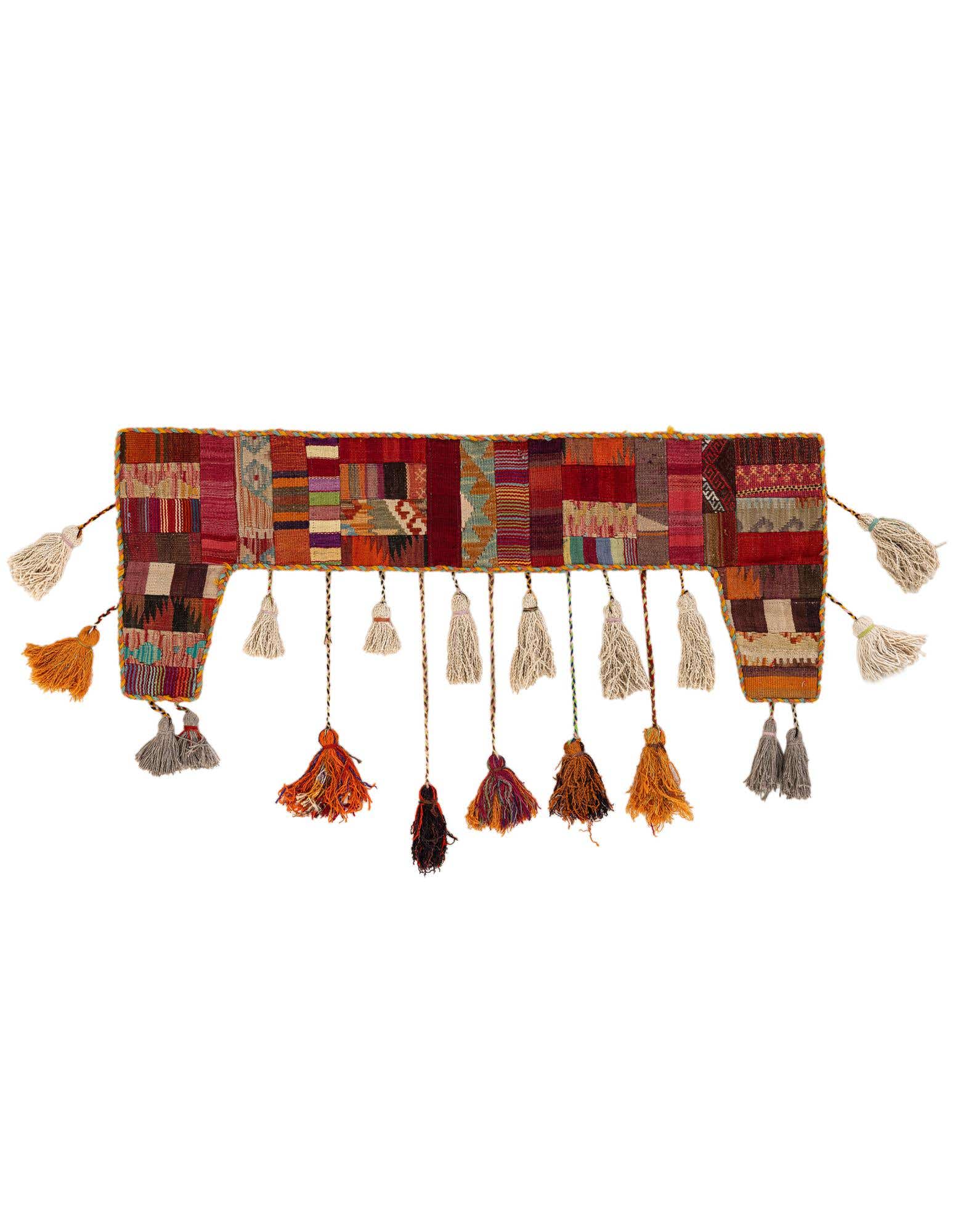 A vibrant 2x3 rectangular multi-colored abstract wool wall art piece with various tassels hanging from the bottom.