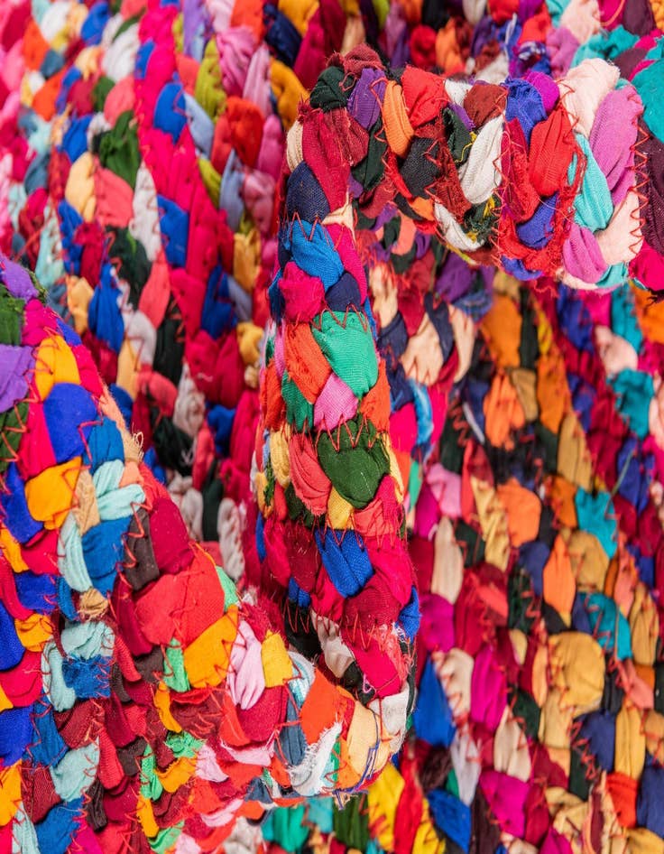 Detail image of  4' 1 x 4' 1  Hand Braided Chindi Round Rug