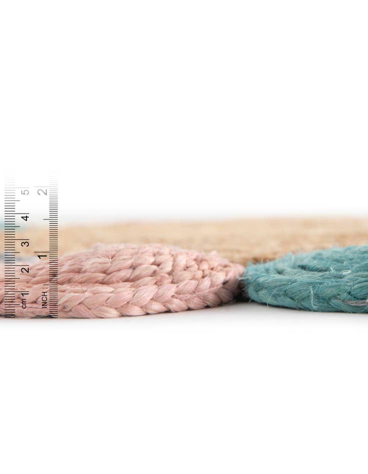 Detail image of  4' 1 x 4' 1  Hand Braided Jute Round Rug