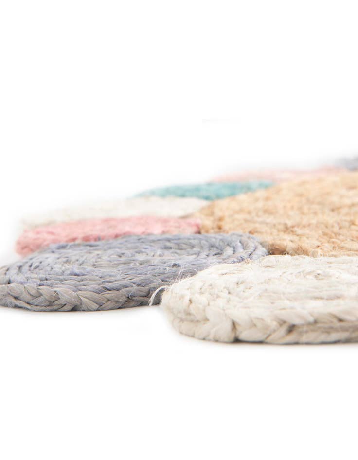 Detail image of  4' 1 x 4' 1  Hand Braided Jute Round Rug