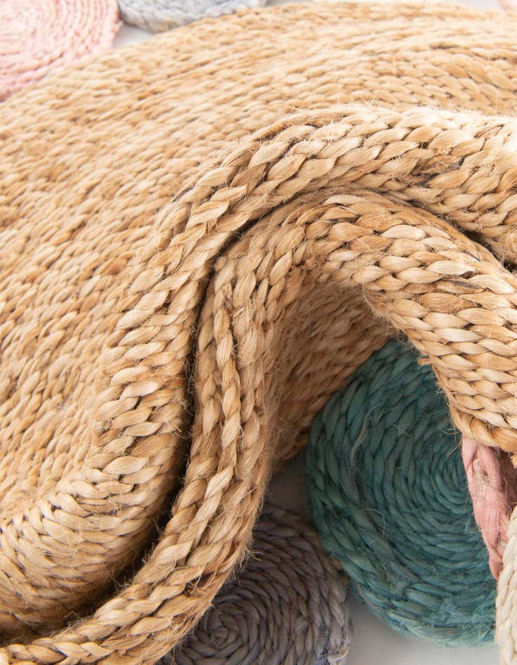 Detail image of  4' 1 x 4' 1  Hand Braided Jute Round Rug